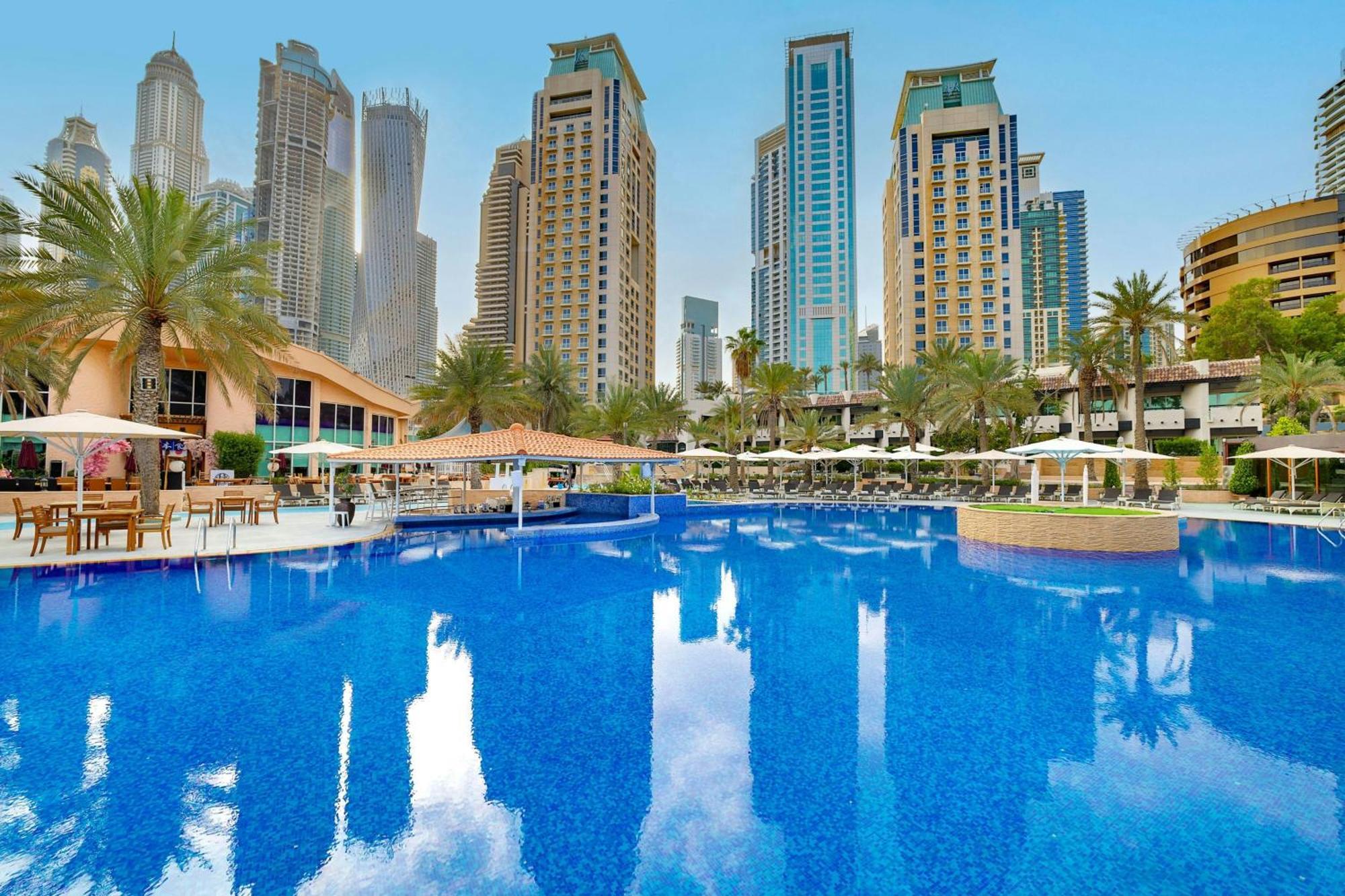 Al Habtoor Grand Resort, Autograph Collection Dubai Esterno foto The swimming pool at Jumeirah Beach Hotel